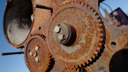 Old rusty gears - part of agricultural machineryの写真素材