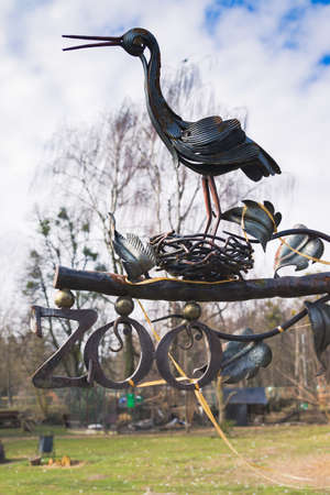 Zoo sign. Zoo sign with forged crane and nestの写真素材