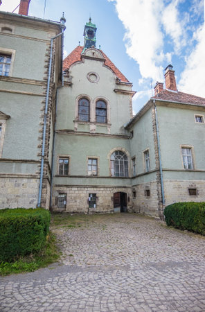 Hunting castle of Count Shenborn in Carpaty Village Chinadiyevo. Hunting Shenborn Palace built 1890-1895 on a warm summer day.. Zakarpattja Transcarpathion Region, Ukraineのeditorial素材