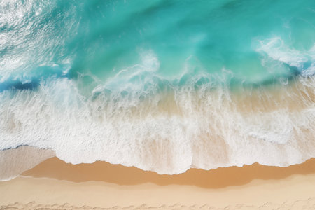 Serene bliss captured. A scene of gently azure sea meeting sun-kissed yellow sands, adorned by white waves viewed from above. Pure relaxation and seaside tranquilityの素材