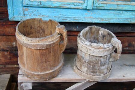 The picture was taken in Ukraine. In one of the villages of the Carpathian Mountains. In the photo there are old wooden mugs used in the past.の写真素材