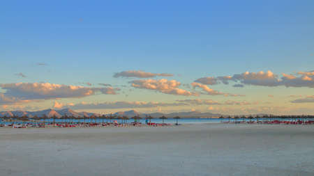 The photo was taken on the Spanish island - Palma de Mallorca. The picture shows an evening on the deserted beach of the island in the off-season.の写真素材