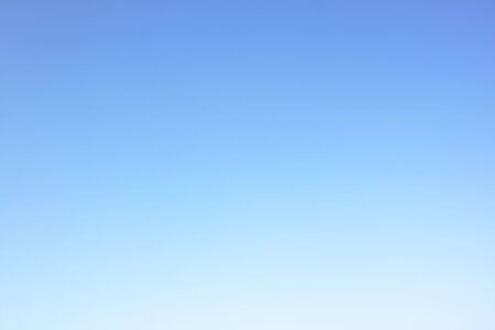 The background color of the sky before sunset blue. Empty sky.の写真素材