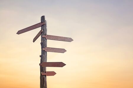 Outstanding Old Wooden sign isolated on blue skyの写真素材