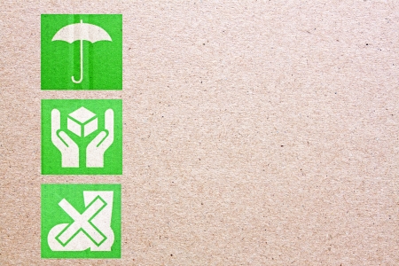 Symbol beside the box packing on cardboard.の写真素材