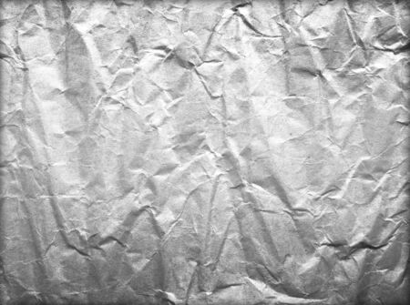 Abstract black crumpled sheet of paper old の写真素材