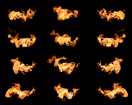 The red flames on a black background.の写真素材