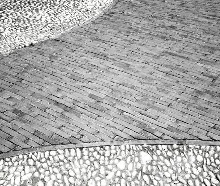 Background texture of old pavement made ââof stone tiles.の写真素材