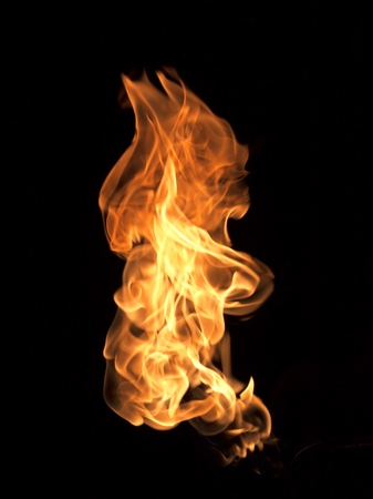 Flame heating Fire isolated on black background.の写真素材