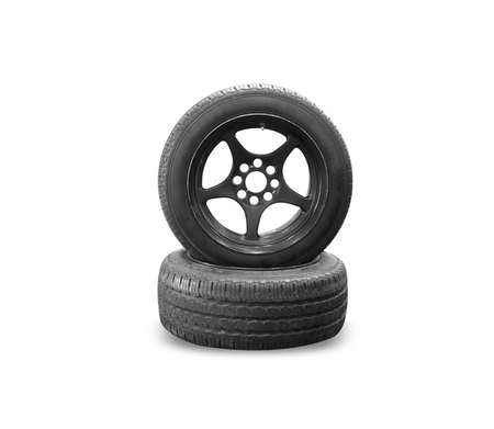 Old black tire isolated on white background.の写真素材