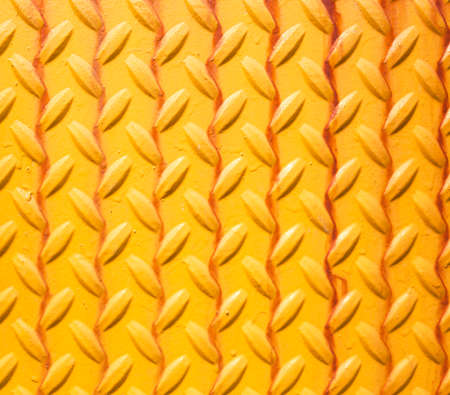 Old rusty metal plate to prevent slipping.の写真素材