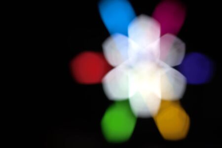 Abstract background bokeh lighting blur black background.