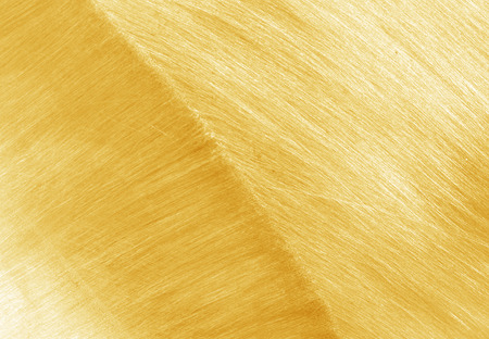 Gold metal stainless steel. Textured abstract backgroundの写真素材