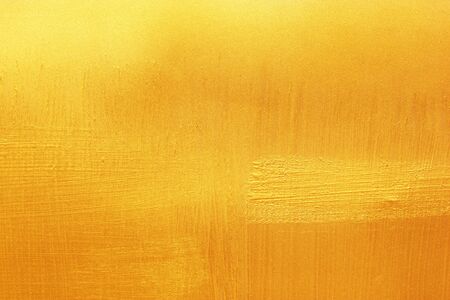 Shiny yellow leaf gold foil texture background