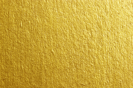 Gold paper background Golden paper surface as backgroundの写真素材
