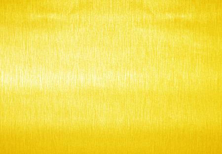Shiny yellow leaf gold foil texture background