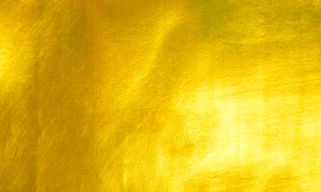 Shiny yellow leaf gold foil texture background