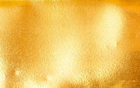 Metal Gold Background Shiny yellow leaf gold texture background