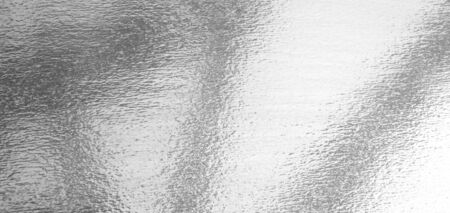 Shiny leaf silver foil paper background textureの写真素材
