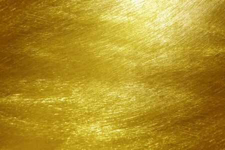 gold polished metal steel texture abstract background.
