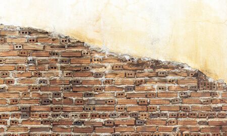 Old wall of red brick wall corrosion chart.の写真素材