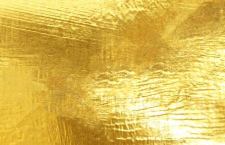 gold polished metal steel texture abstract background.