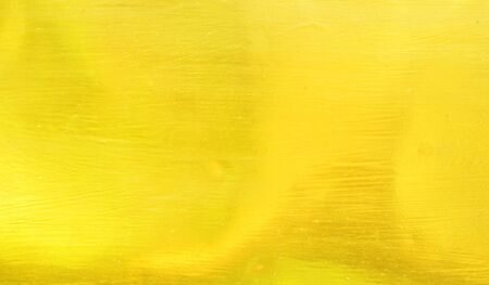 gold polished metal steel texture abstract background.の写真素材