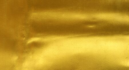 gold polished metal steel texture abstract background.