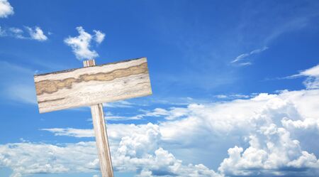 Old wooden sign sky background business card designの写真素材