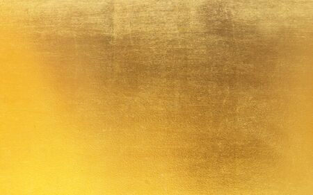 gold polished metal steel texture abstract background.の写真素材