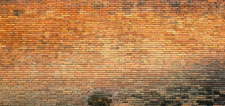 brick wall of red color wide of masonryの写真素材