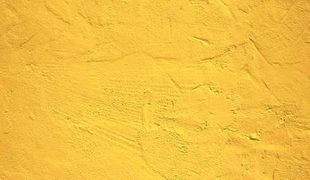 Golden plaster wall texture background