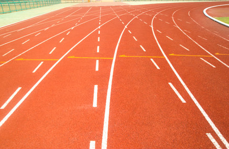 Red running tracks in a stadium design background
