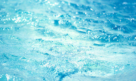 water in swimming pool rippled water detail backgroundの写真素材