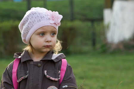 Girl on the lawnの写真素材