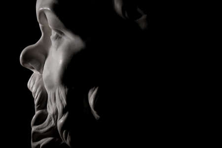 Socrates statue isolated on black backgroundの写真素材