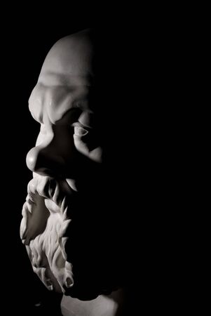 Socrates statue isolated on black backgroundの写真素材