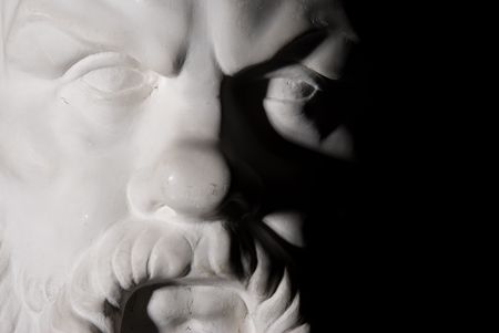 Socrates statue isolated on black backgroundの写真素材