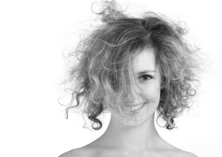 Girl with crazy hair isilated on a white backgroundの写真素材