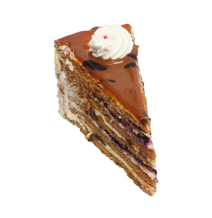 Slice of cream cake with chocolate on the white background の写真素材