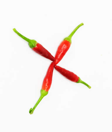 red hot chili pepper isolated on white の写真素材