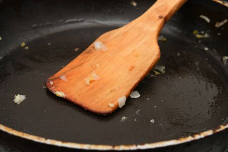 wooden spoon in the panの写真素材