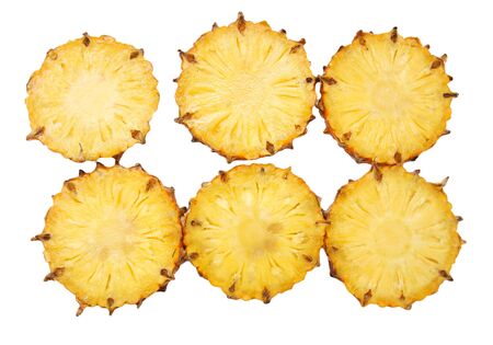 sliced pineapple on white backgroundの写真素材