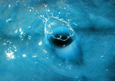 Splash blue water over abstract background. Nature の写真素材