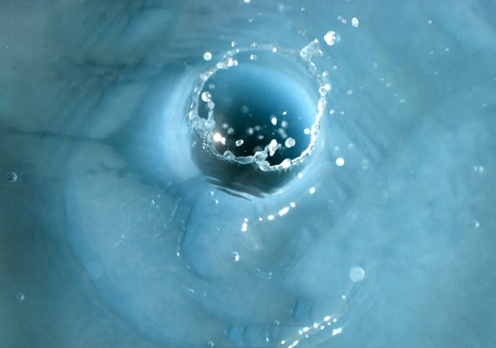 Splash blue water over abstract background. Nature 