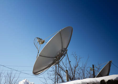 satellite dish on the roofの写真素材