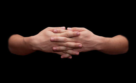 man's hands on a black backgroundの写真素材