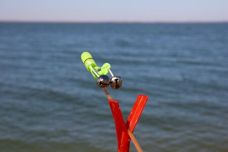 fishing bell on the fishing rodの写真素材