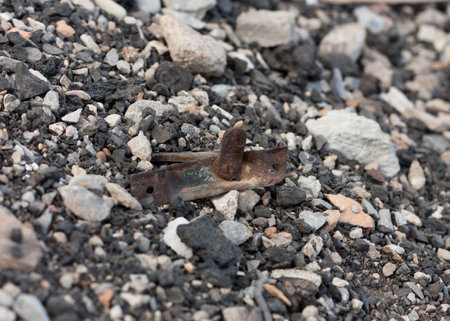 rusty parts on the ground