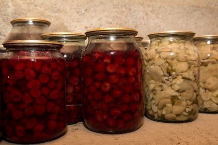 canned jars on a shelfの写真素材